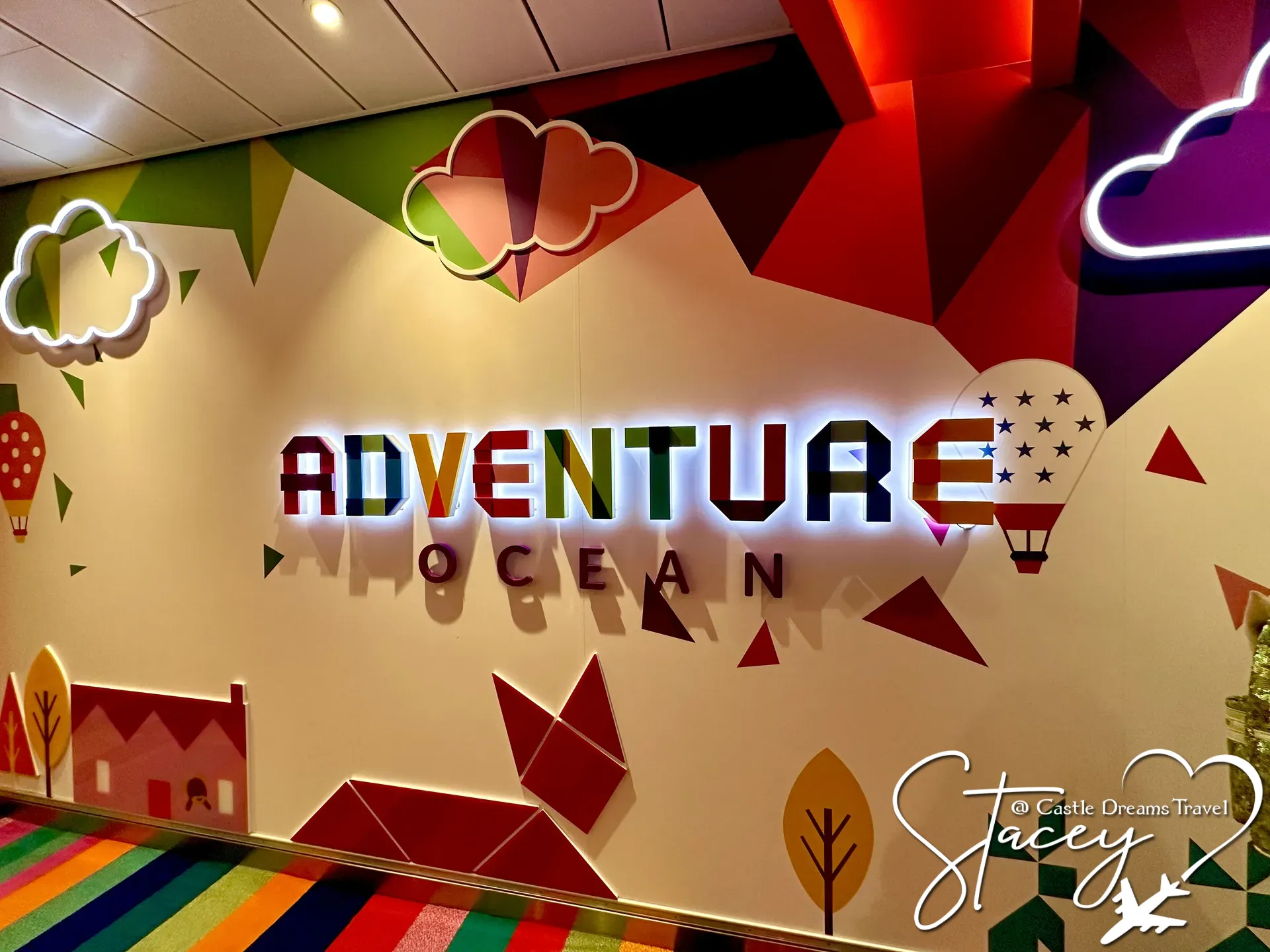 The brightly colored Adventure Ocean kids club wall aboard a Royal Caribbean ship