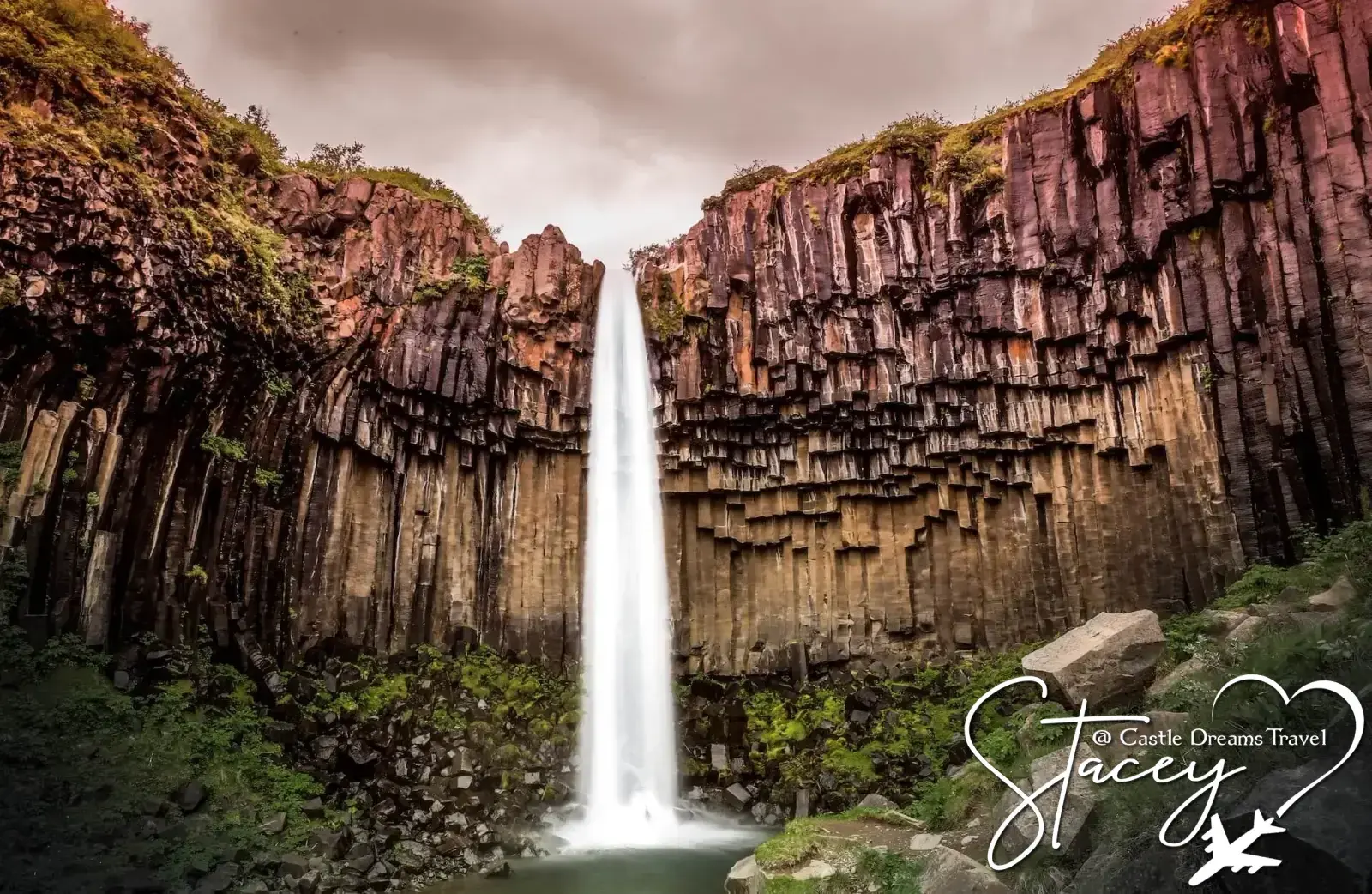 Powerful waterfall cascading over Iceland's volcanic cliffs
