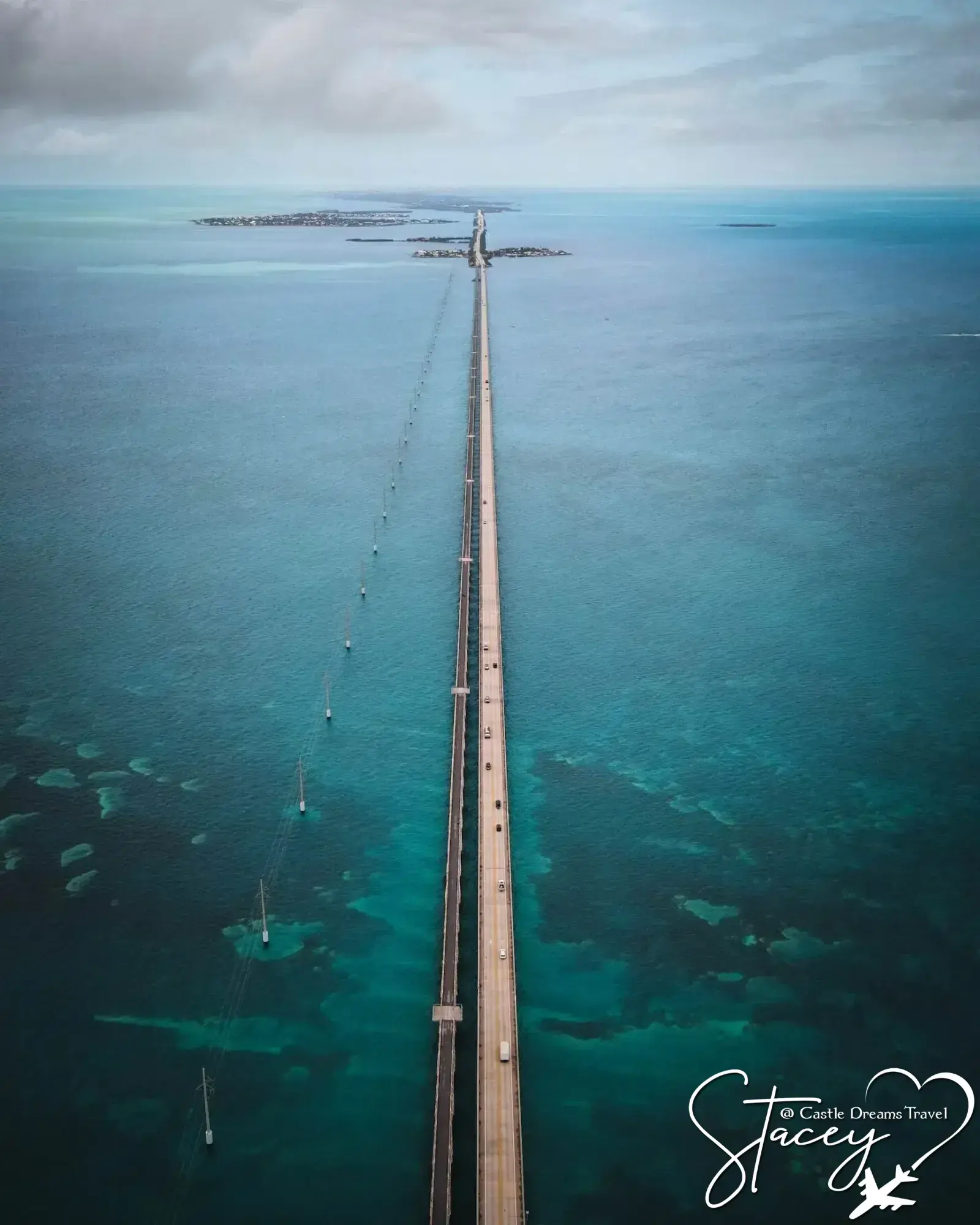 Aerial view of the Overseas Highway stretching across turquoise water in the Florida Keys