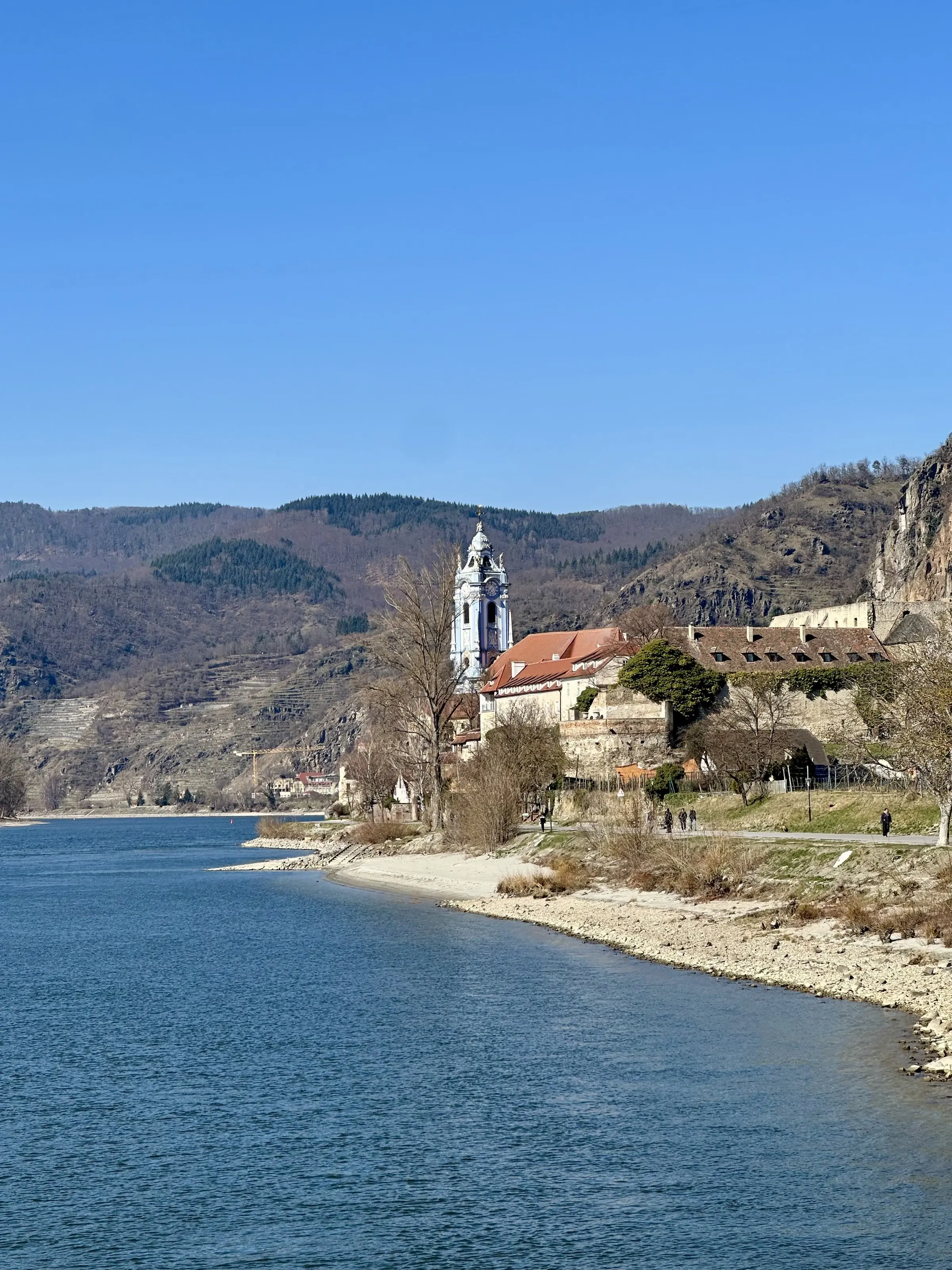 The blue-and-white tower of Dürnstein Abbey above the Danube, Wachau Valley, Austria