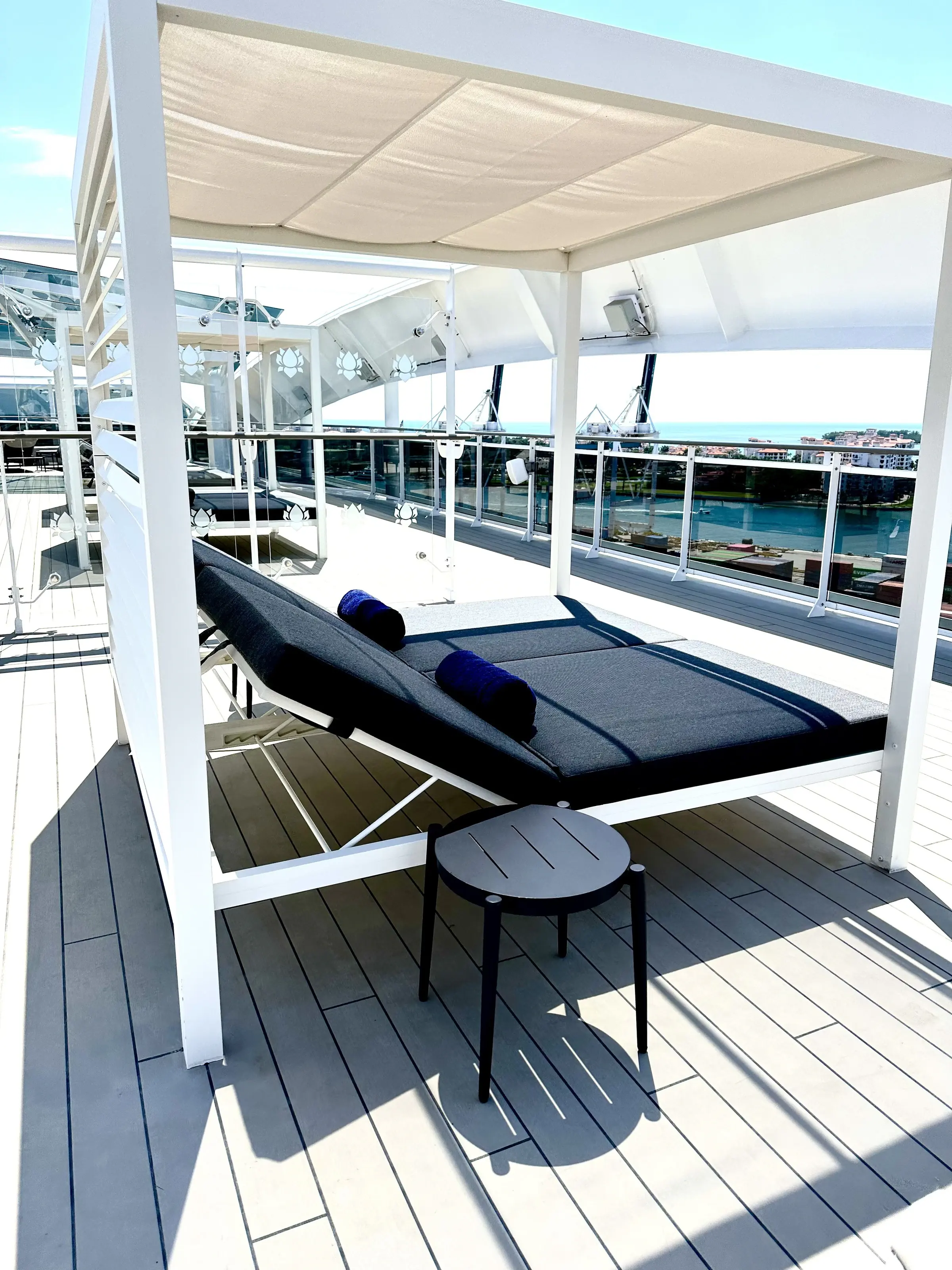 A shaded daybed cabana on the MSC Yacht Club deck