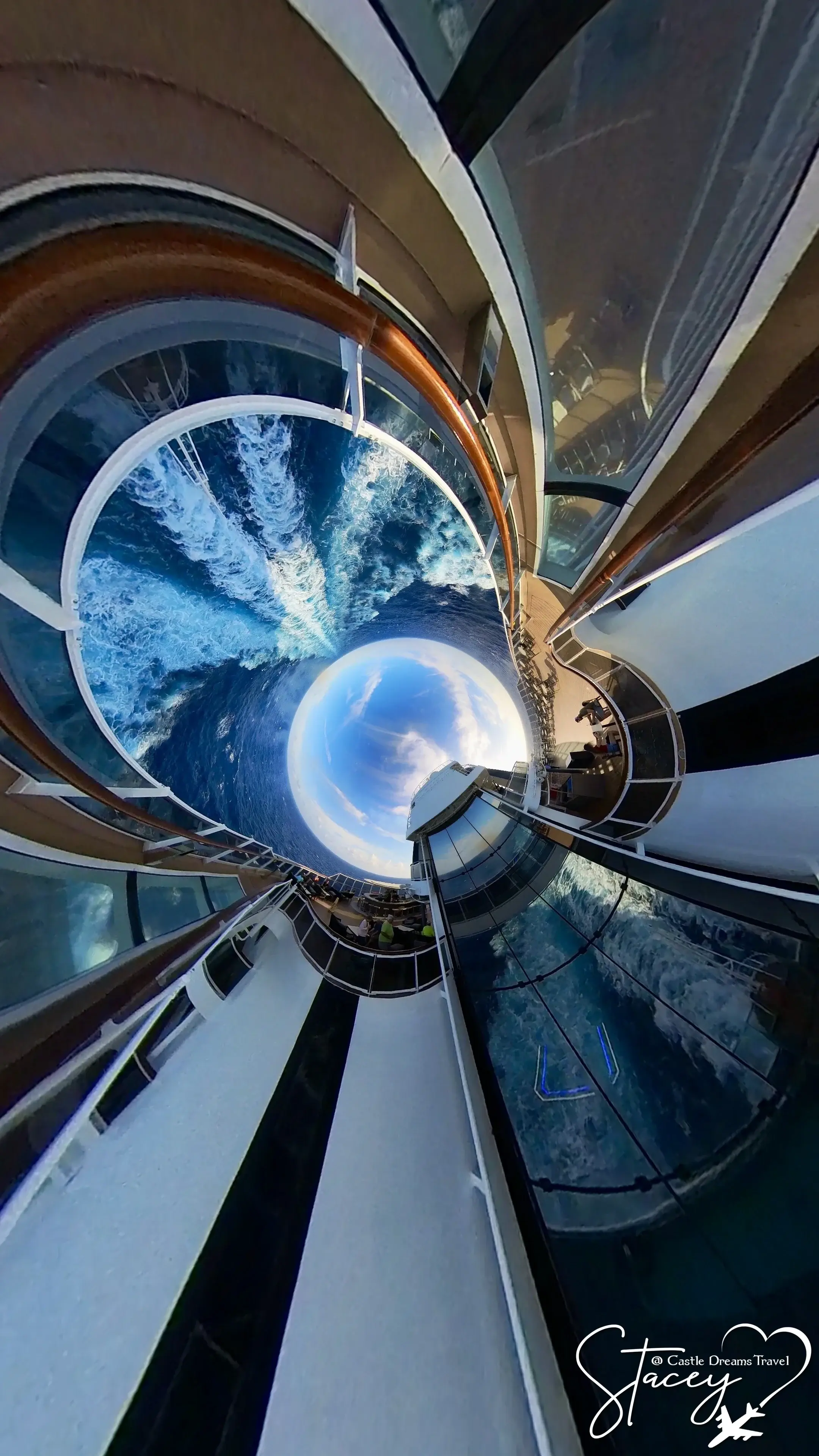 A swing ride suspended high over the ocean on the side of an MSC ship